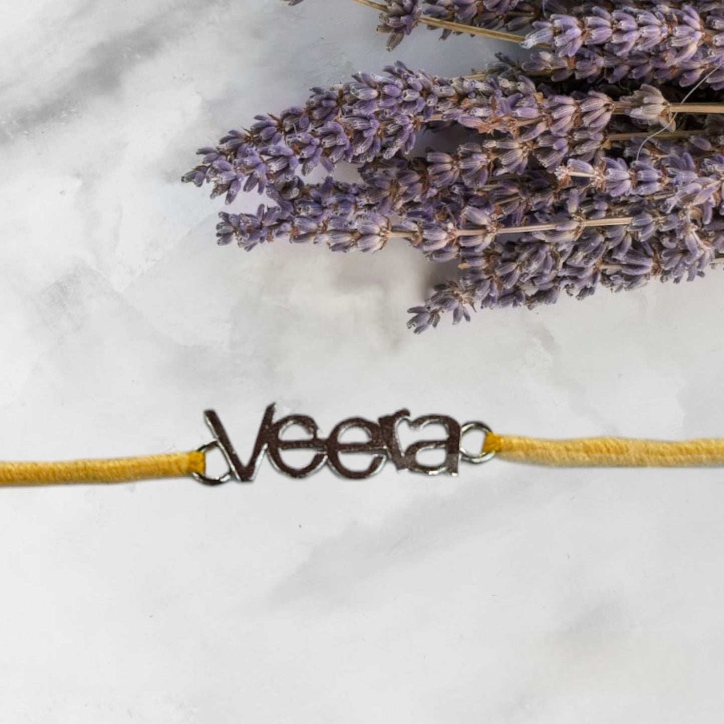 "VEERA" yellow thread 92.5 purity silver rakhi