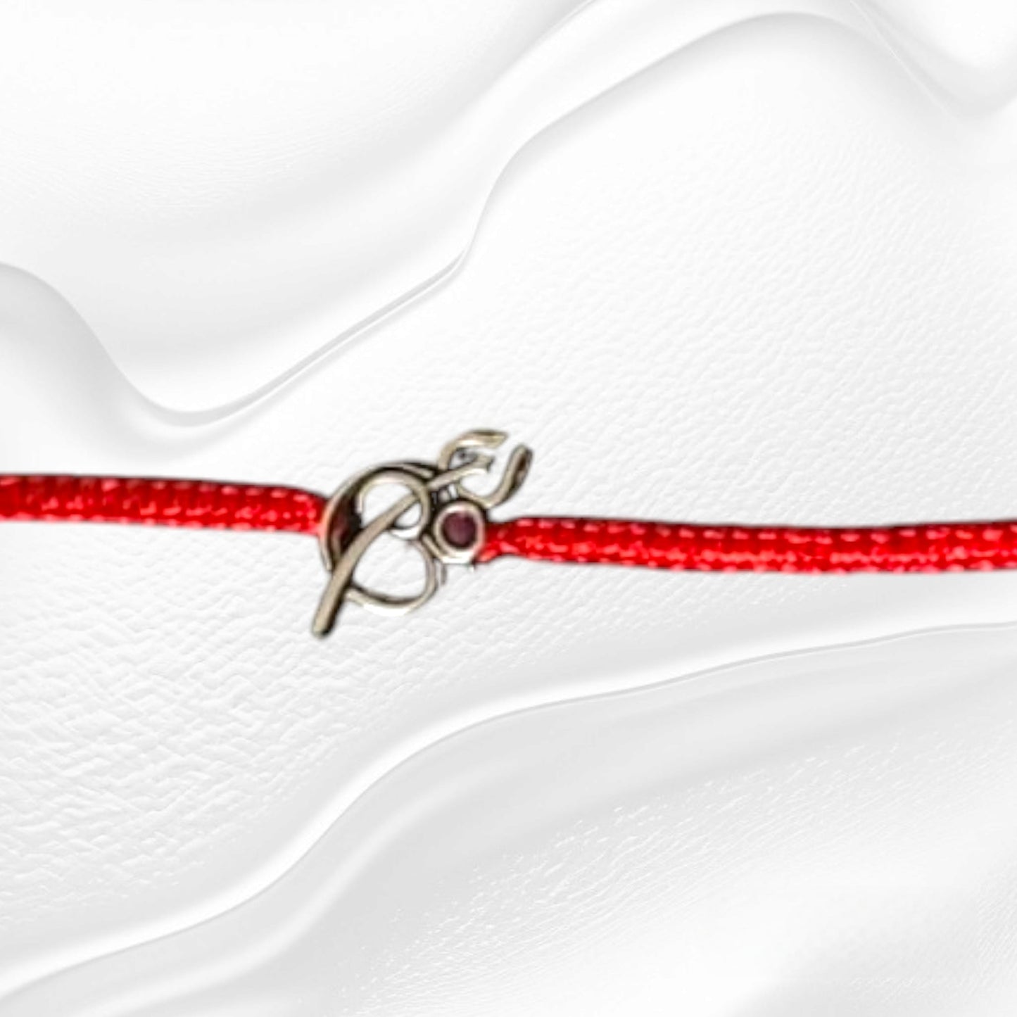 Aum with Lord Shiva trident red thread 92.5 purity Rakhi