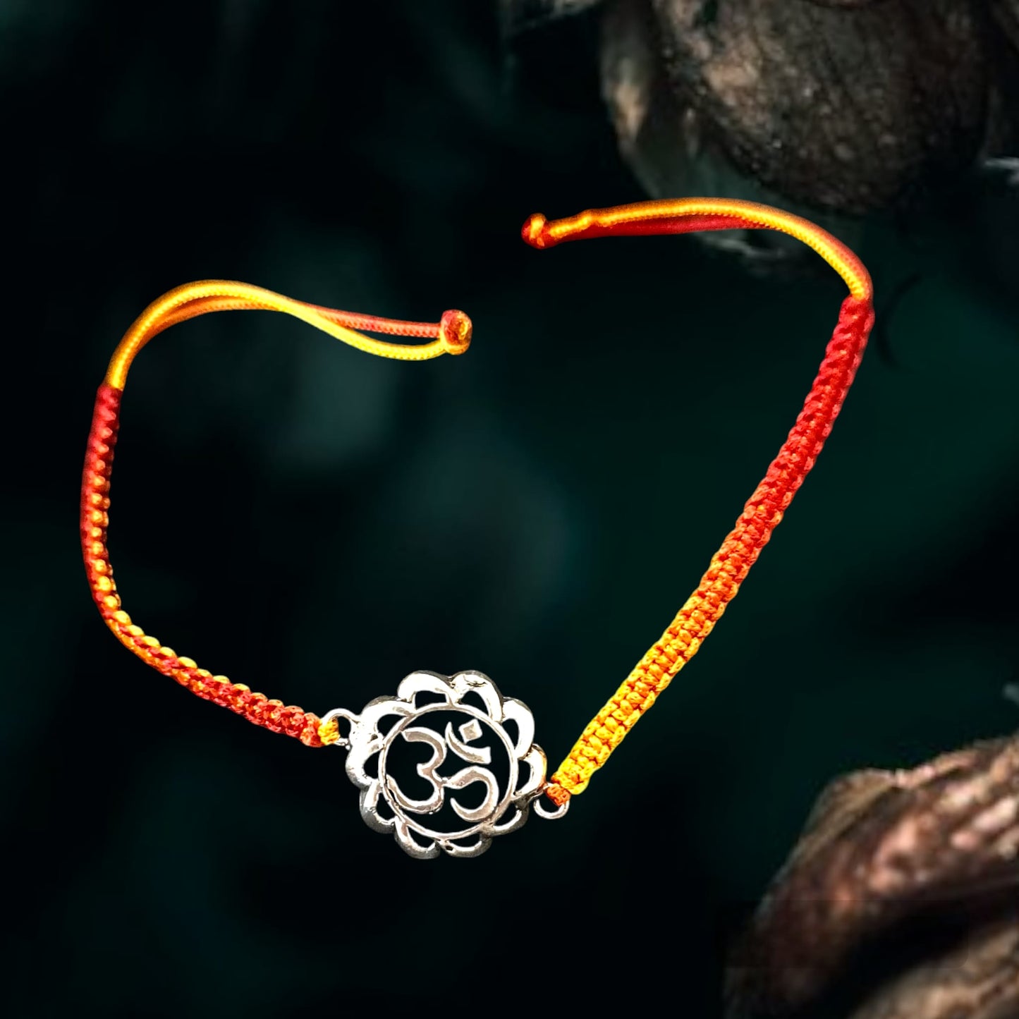 Flower shaped Aum rakhi bracelet